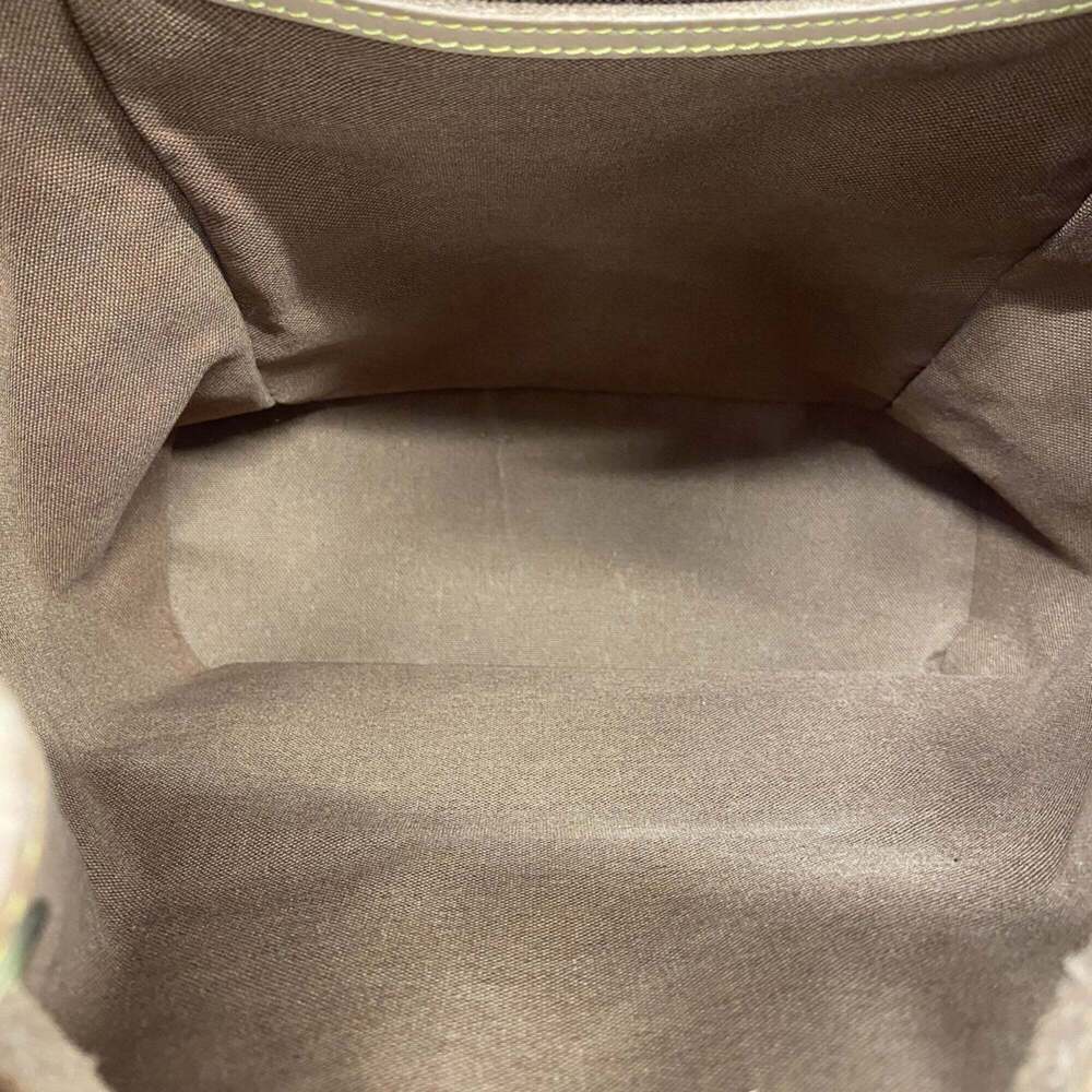 LOUIS VUITTON Brown Monogram Backpack - Picture 4 of 13